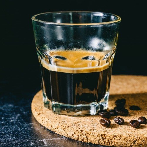 The origins of espresso, its development into the drink we know and love today, and a classic recipe for making it at home