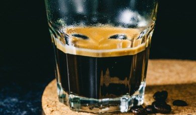 The origins of espresso, its development into the drink we know and love today, and a classic recipe for making it at home